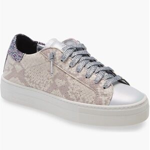 Python print.  Street-chic sneaker with a 1 1/4” chunky platform.